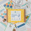 Educational materials and a box labeled 'Majestic Lions' from it's our planet too on a pink background.